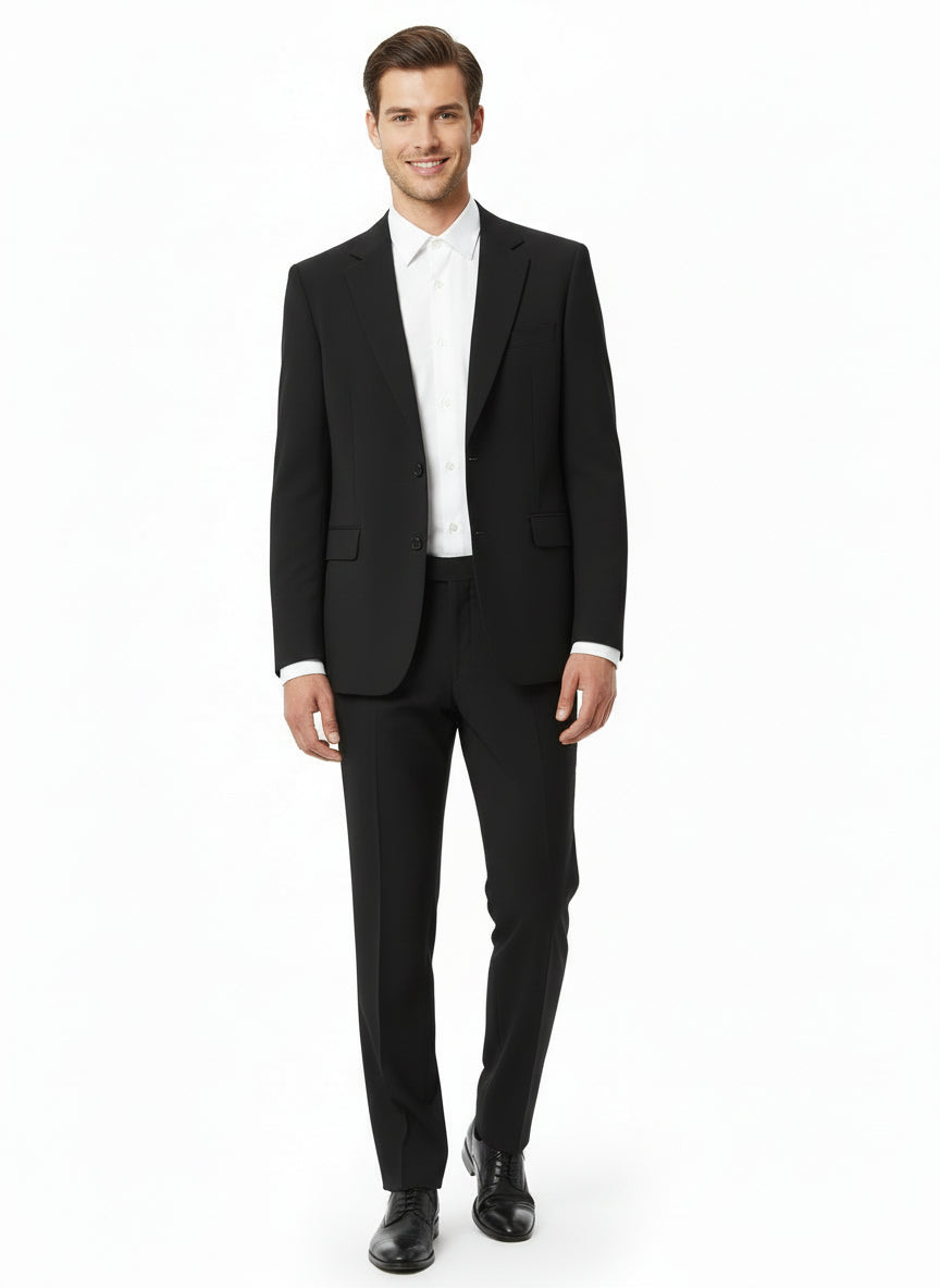 Musta puvuntakki miehille. Materiaali laadukasta villasekoitetta. Takissa rintatasku ja läppätaskut. Takana helmassa halkio. Suljetaan kahdella napilla. Sisäpuolella sileä vuori ja kaksi povitaskua. Olkapäillä kevyet toppaukset.