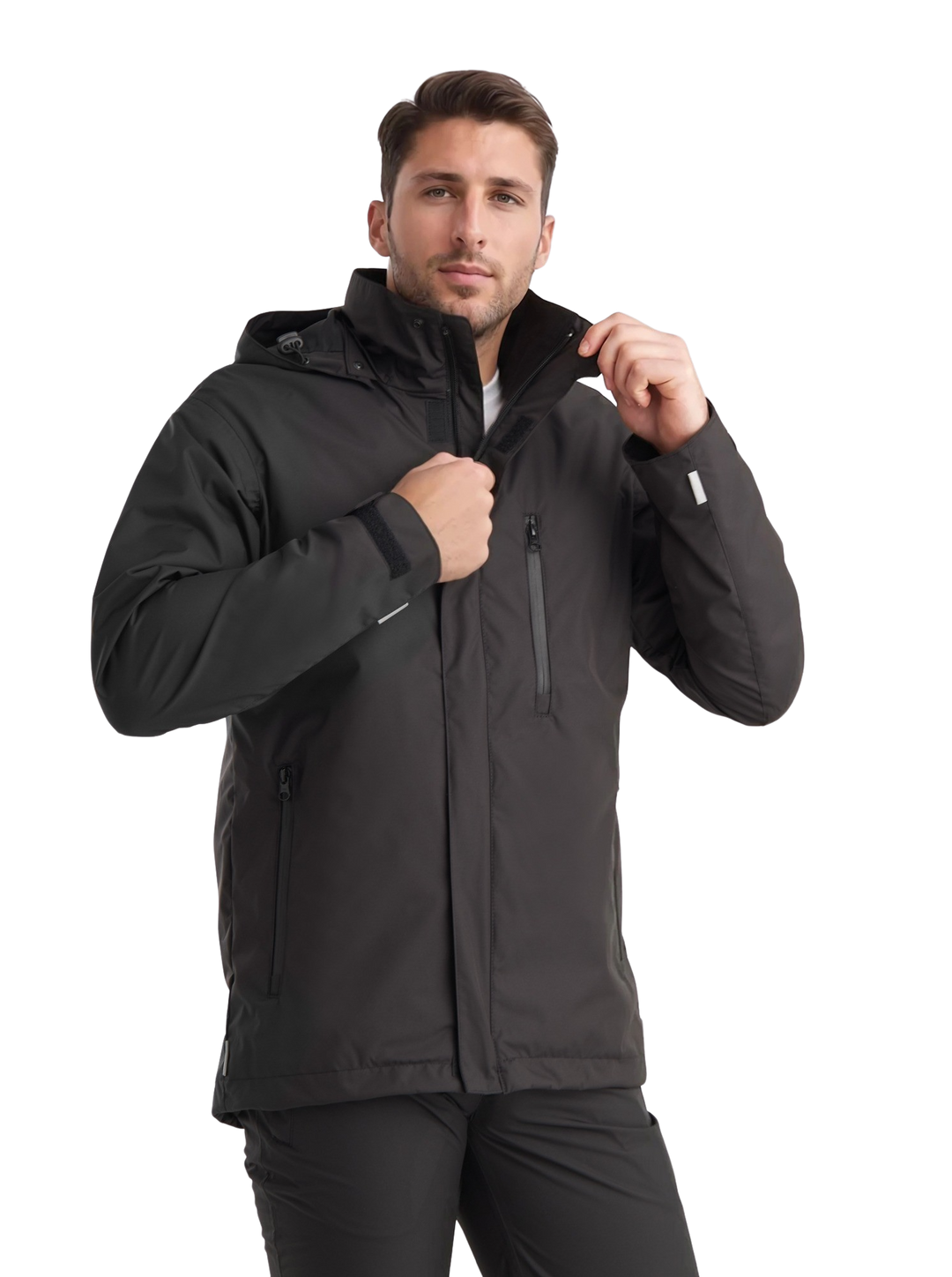 Kuvassa miesmallilla musta kuoritakki Image Wearin mallistossa sekä mustat joustavat reisitaskuhousut.