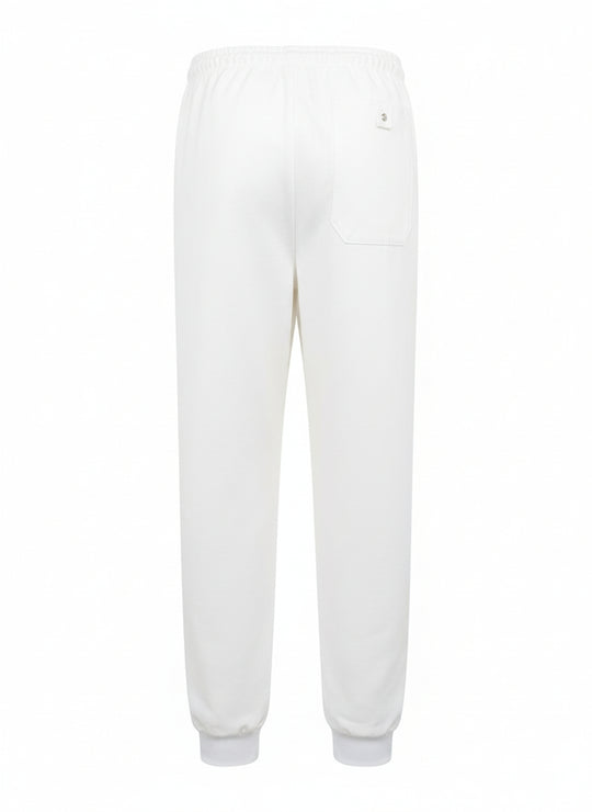 Valkoiset kevyet työhousut takaapäin kuvattuna.