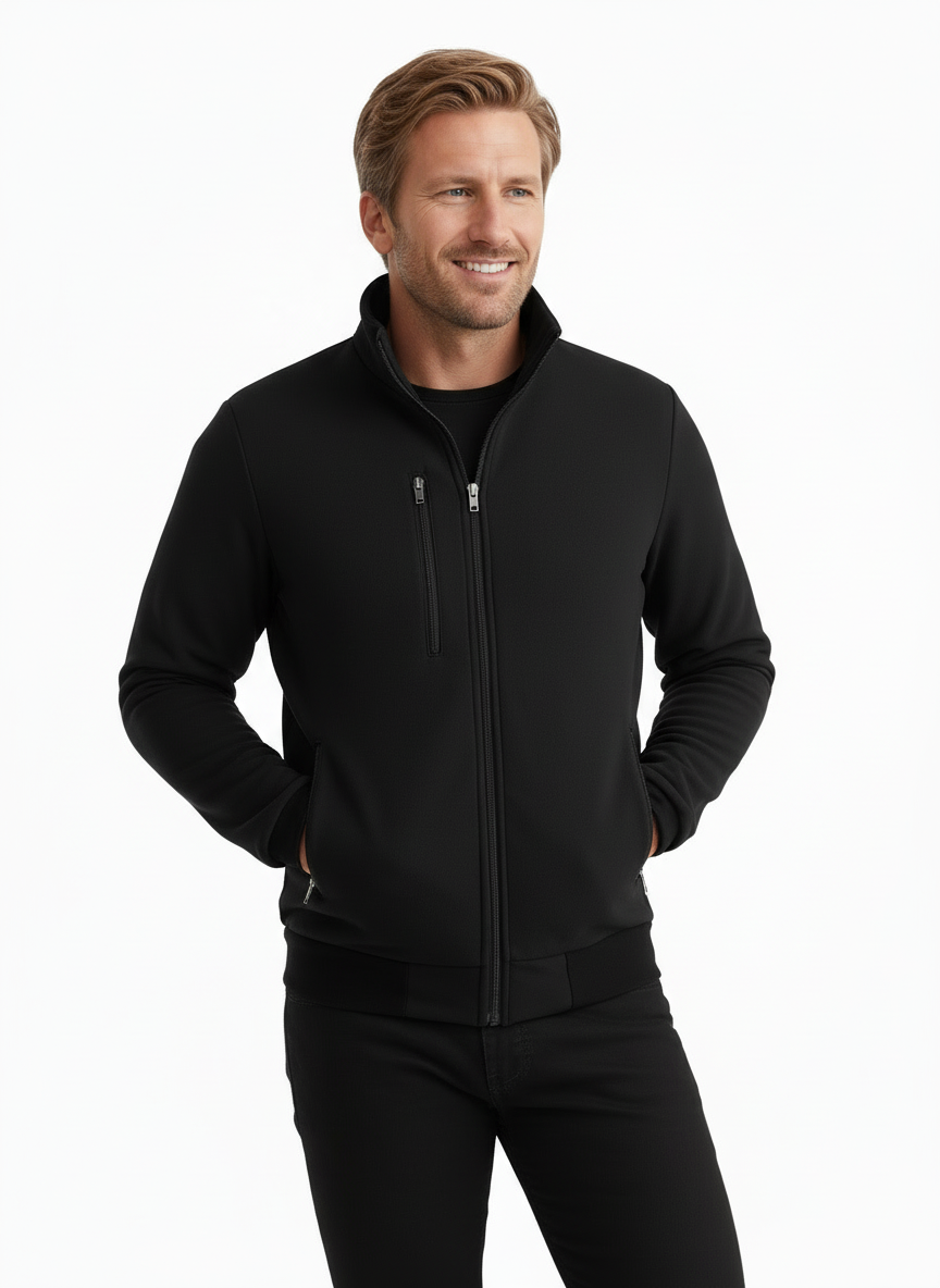 Kuvassa miesmallilla Image Wearin musta collegetakki sekä mustat joustavat työfarkut. Collegetakin alla mallilla on musta unisex t-paita.