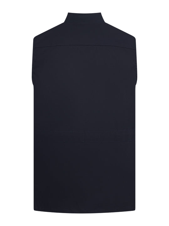 Tummansininen unisex työliivi takaapäin kuvattuna. 