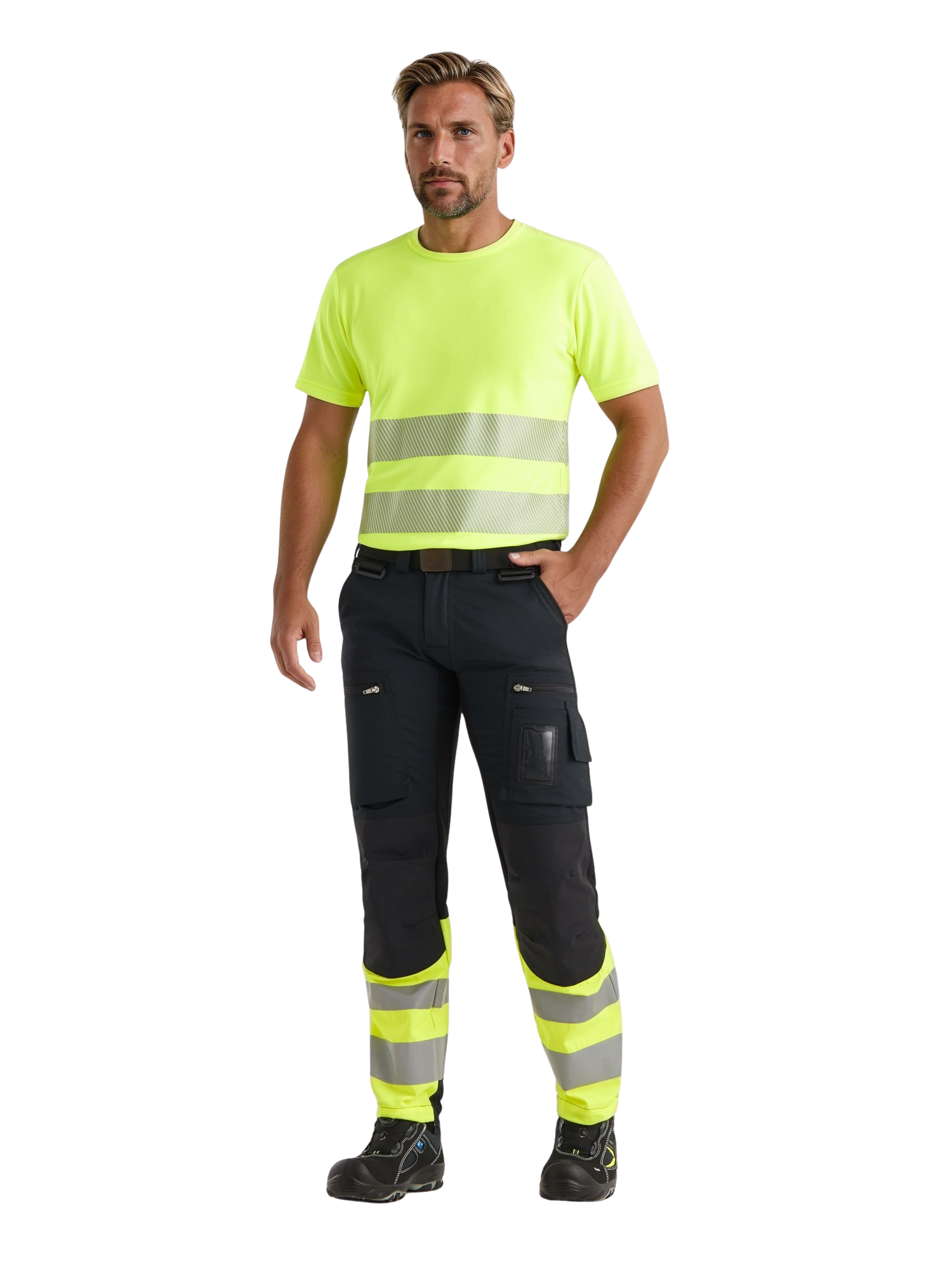 Miesmallilla kuvassa päällä keltainen varoitus t-paita ja musta-keltaiset reisitaskuhousut. Jalassa mallilla on Sievin Roller turvajalkineet. 