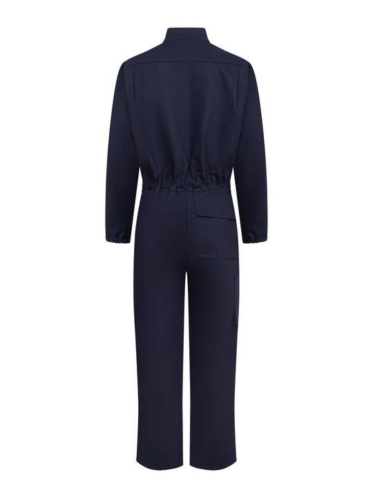 Tummansininen palosuojattu työhaalari takaapäin kuvattuna. 