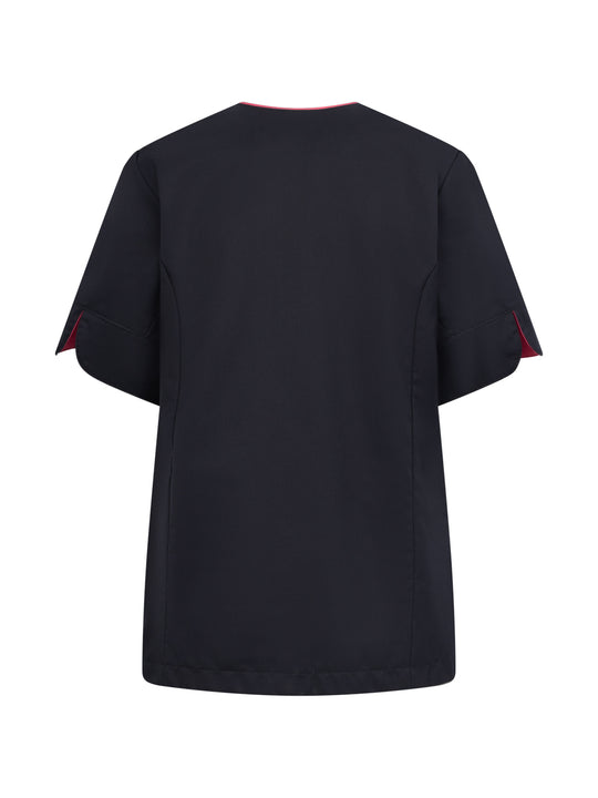 Tummansininen hoitoalan lyhythihainen tunika takaapäin kuvattuna. 