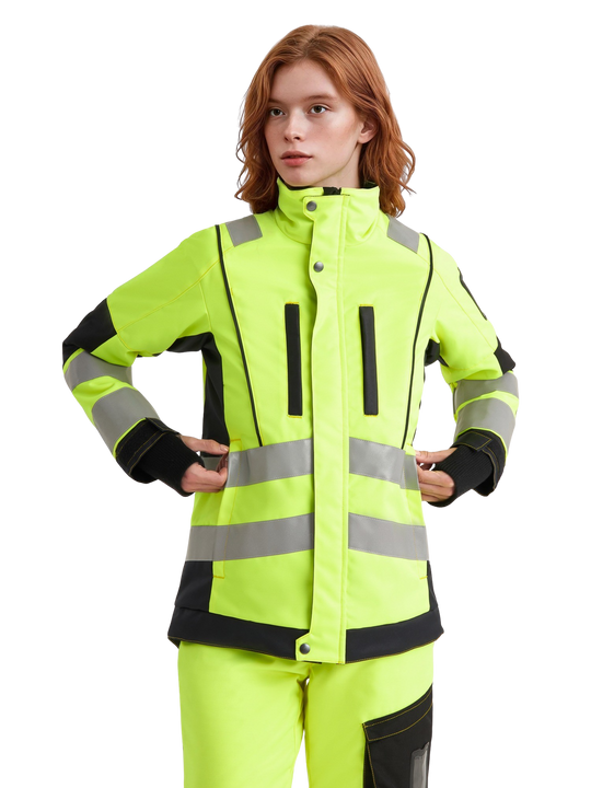 Kuvassa naismallilla päällä Image Wearin keltainen varoitustakki lk2 ja varoitushousut lk2. Molemmat tuotteet naisten mitoituksella. 