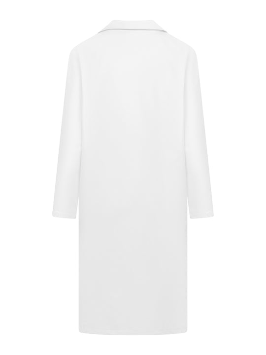 Naisten valkoinen työtakki takaapäin kuvattuna. 