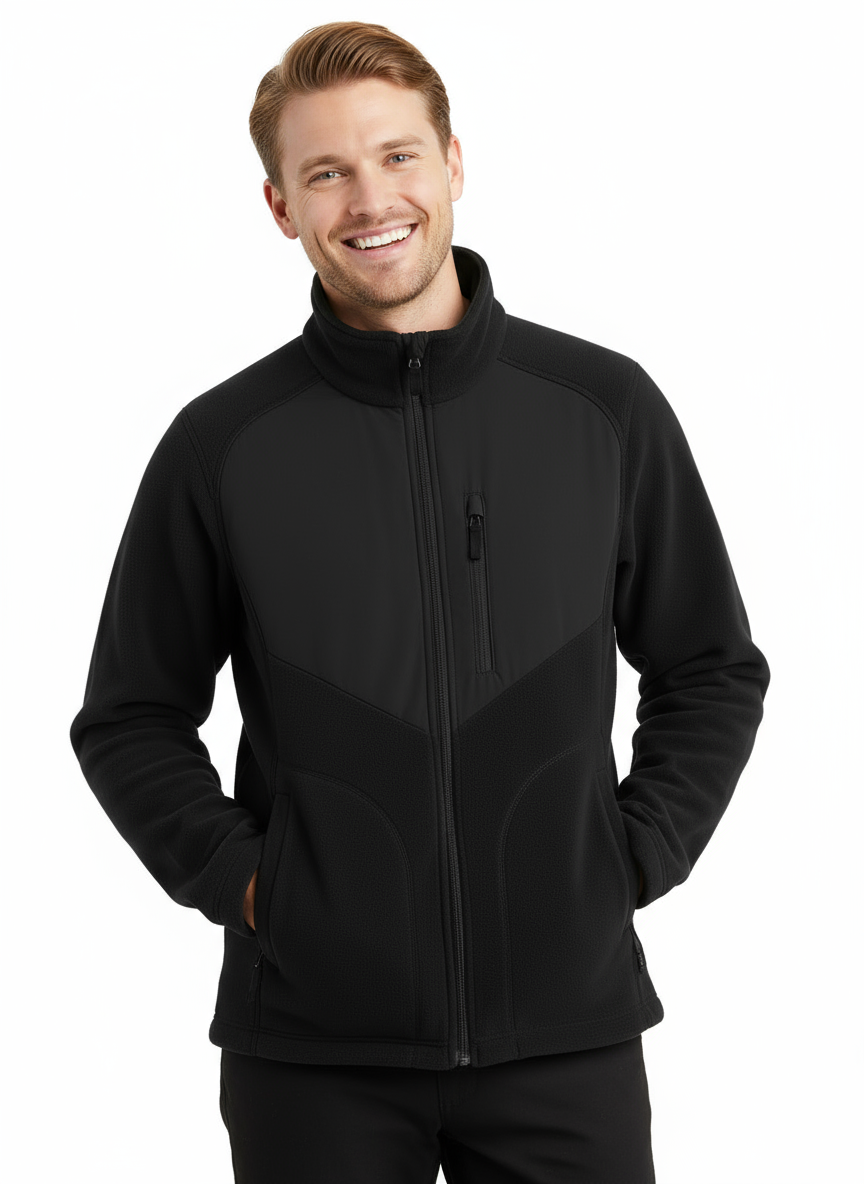 Kuvassa miehellä päällä Image Wearin musta unisex Fleece-takki. 
