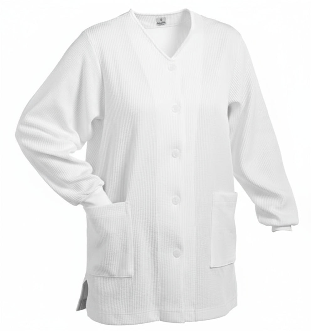 Kuvassa valkoinen pitkähihainen ja tunikamittainen vilutakki. 