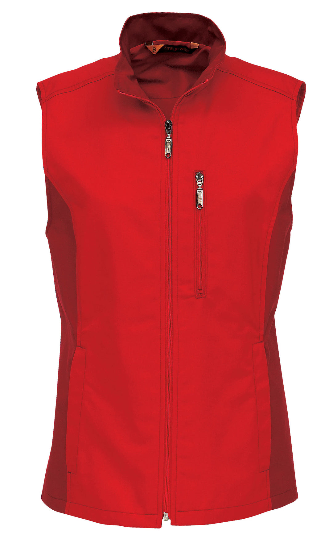 Punainen kangasliivi, jossa vetoketju edessä. Rintatasku myös vetoketjullinen, alataskut. Aavistuksen vartalonmyötäinen malli.